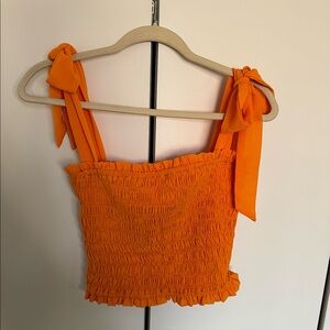 Heathery orange top. Never worn. Great for summer!